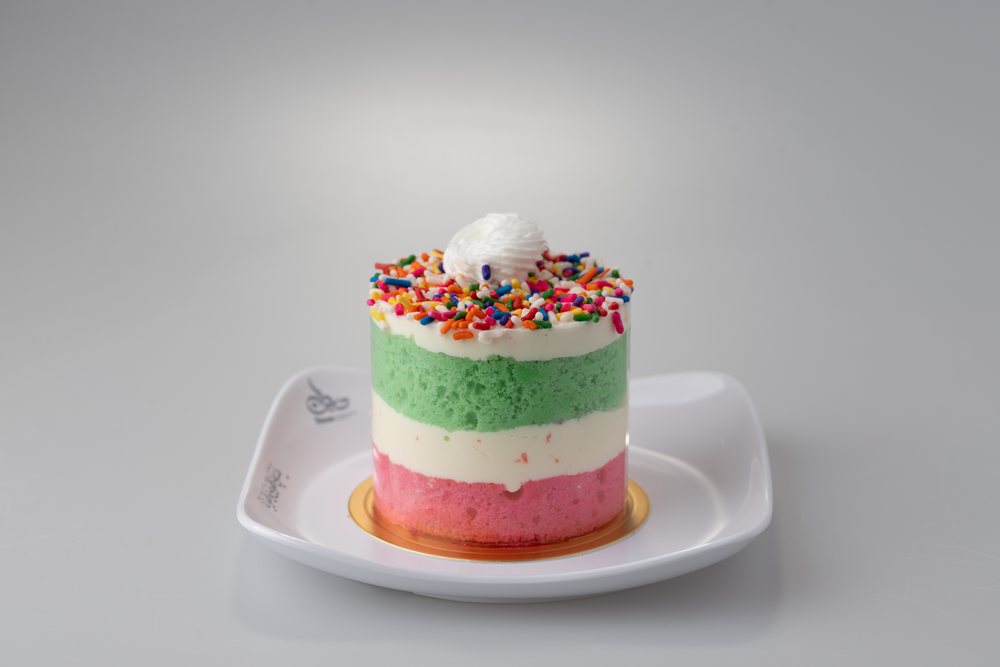 Rainbow layer cake slice